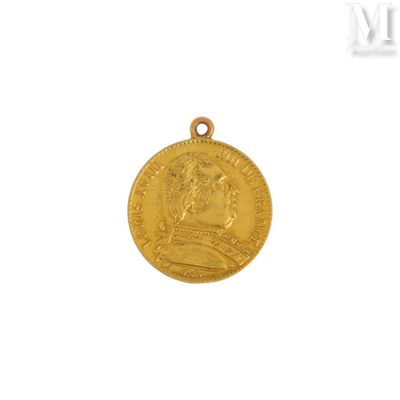 gros plan d'une pièce d'or sur laquelle figure le visage d'un homme