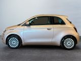 a picture of a small white car parked in a room