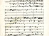 an old sheet of music with notes on it