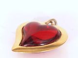 an image of a red glass heart shaped pendant on a gold plated chain