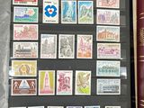 a picture of a collection of stamps and a book