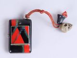 a cell phone that has a red and black design on it