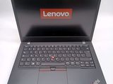 the lenovo laptop is open and ready to be used