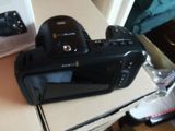 a camera sitting on top of a box on a table