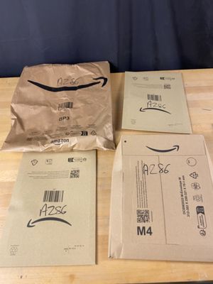 Lot de 4 colis Mystère (Retour Amazon,NPAI ,Adresse incomplè…