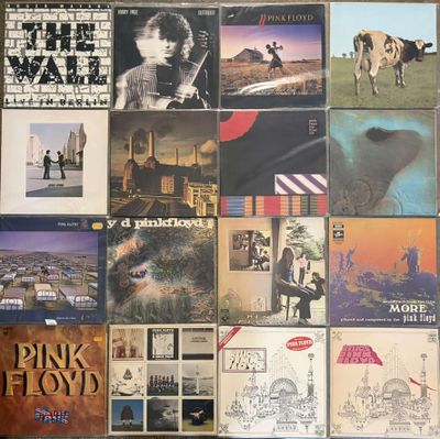 a lot of different album covers on the wall