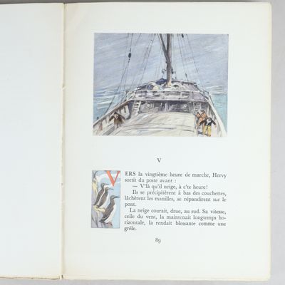 an open book with a picture of a bird on it