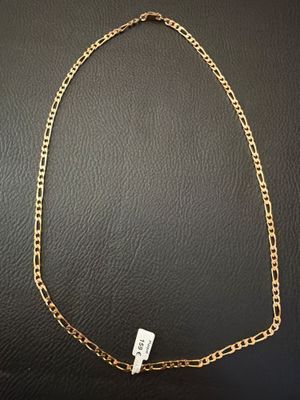 a gold chain with a tag attached to it