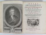 an old book with a picture of a man in a frame