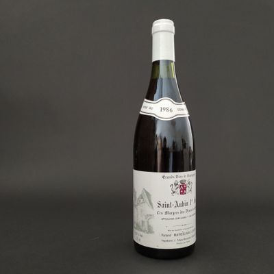 a bottle of wine that is sitting on a table