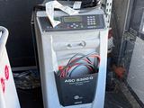 a machine that is sitting next to a trash can