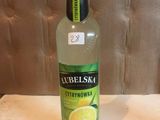 a bottle of lemonade sitting on a table