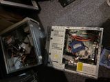a computer that is sitting on the floor next to a laptop
