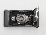 an old camera that is sitting on a table