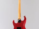 a red electric guitar hanging from a wooden stand