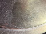 a close up of a metal object on a table