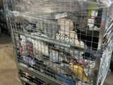 a metal cart with a bunch of stuffed animals inside of it