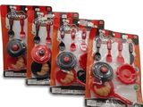 trois paquets d'ustensiles de cuisine rouges et noirs dans des sacs en plastique
