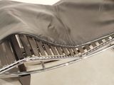 an image of a lounge chair with a cover on it