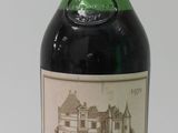a bottle of wine that is sitting on a table