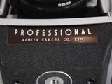 a close up of a camera with a professional sticker on it