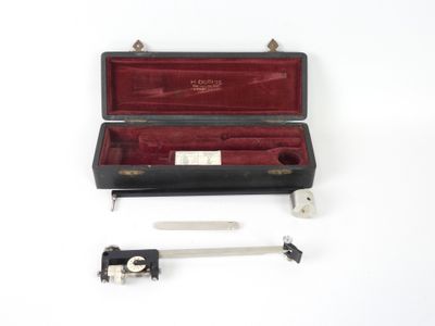 a black case with a knife and other items in it