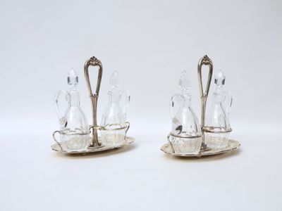 a pair of silver plated salt and pepper shakers