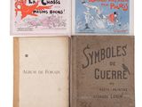 trois livres sont empilés sur une surface blanche