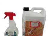 un gros plan sur un flacon de produit nettoyant à côté d'un autre flacon de produit nettoyant