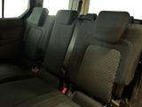 four seats in the back of a van with no one in it