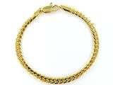 un bracelet en or jaune muni d'un fermoir en forme de serpent