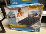 an inflatable air mattress is on display in a store