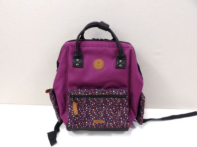 purple and black backpack with a flower design on the front