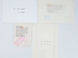 three envelopes and a piece of paper with some writing on them