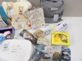 a table with a lot of baby items on it