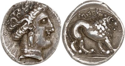 a silver coin with an image of a man on a horse