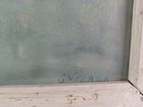 a picture of a painting of a cat on a window sill