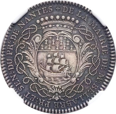 an old silver coin with a ship on it on a white background