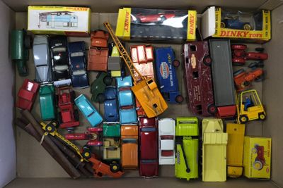 a box full of toy cars and trucks in it