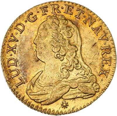 une pièce d'or ornée d'une tête de femme