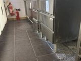 an image of a commercial kitchen with stainless steel appliances