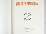 an open book with a picture of a cat on it