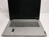 an open laptop computer sitting on top of a white table
