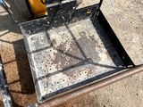 a small cart that has a gas can in it