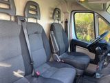 four seats in the back of a van with a steering wheel