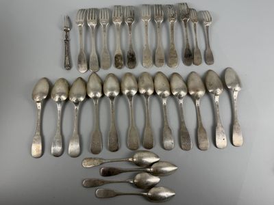 a lot of silver spoons and forks on the table