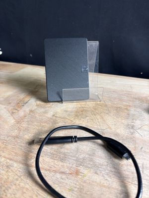 a black cable that is connected to a black device