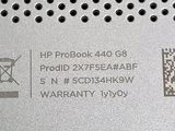 a close up of a metal plate with a qr code on it