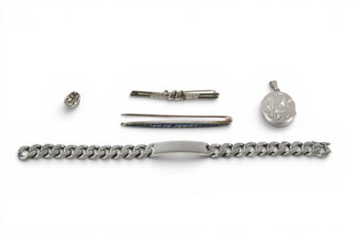 a silver bracelet with a chain and a watch on it