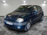 a picture of a small blue car parked in a garage
